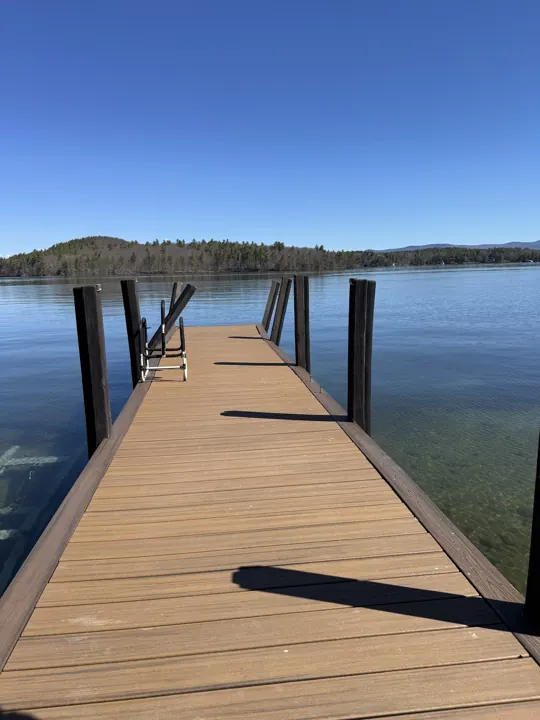 Composite walkway with posts still visibly leaning at the end