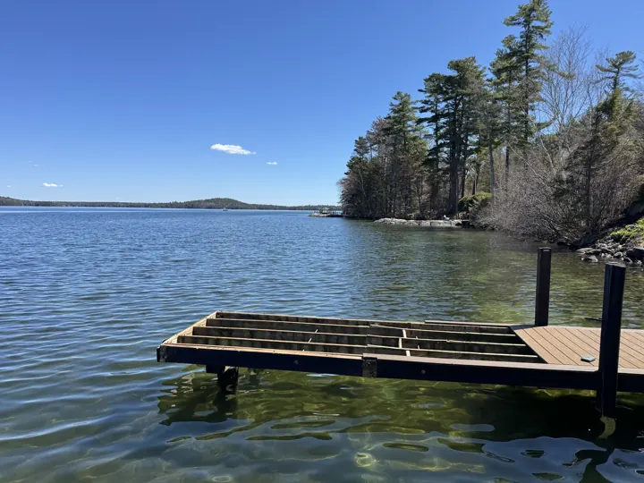 Side view of the dock with decking removed and old framing exposed